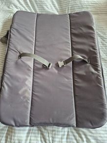 Travel cot with changing table