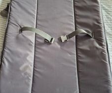 Travel cot with changing table
