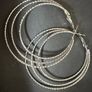 Stylish silver-tone earrings in excellent/new condition. Image 4