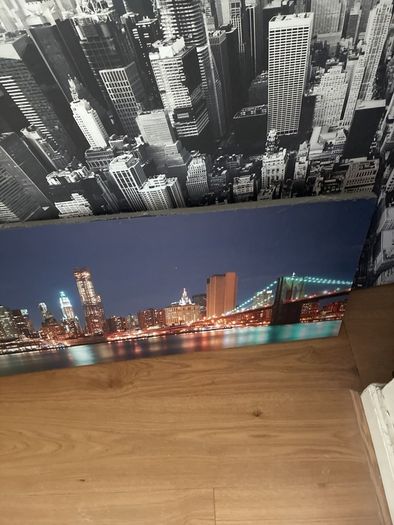 2 very large Manhattan pictures. One lights up