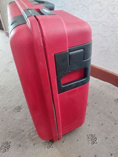 Red hard-shell suitcase