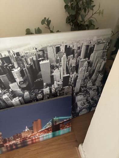 2 very large Manhattan pictures. One lights up