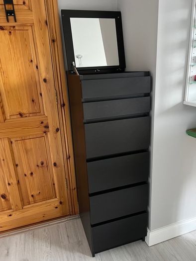 Chest of drawers with mirror
