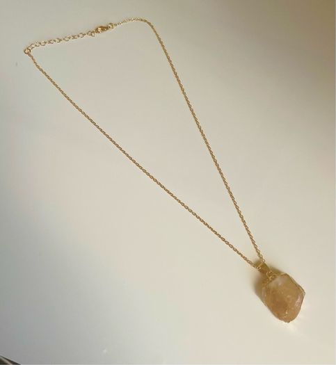 Costume necklace with stone pendant