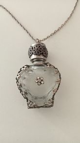 Unique Necklace with Ornate Bottle Pendant