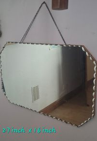 Scalloped edge mirror