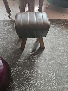 stressed leather green stool..