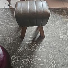 stressed leather green stool..