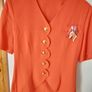 Short Sleeved Orange Jacket Image 3