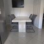 solid marble dining and 6 chairs. Image 2