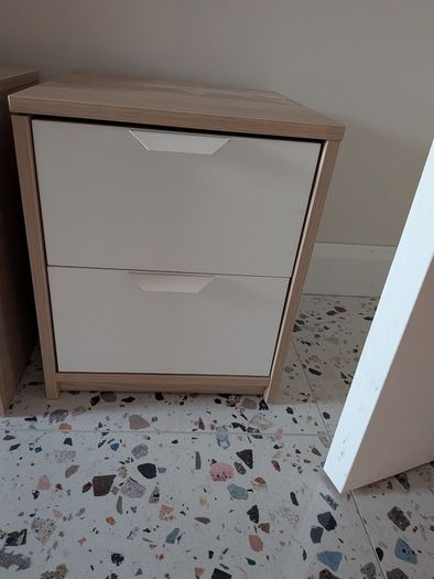 Two Ikea two-drawer bedside locker