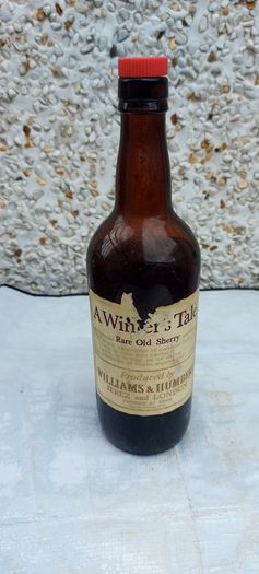 vintage bottle of winters tale sherry 3/4 full ,found in a old pub closed down,