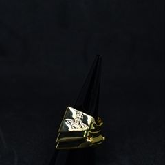 A Vivienne Westwood armour ring.