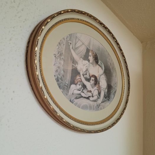Vintage ornate framed pair of prints