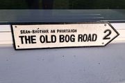 the old bog road cast iron sign