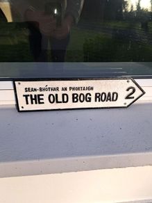 the old bog road cast iron sign