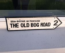 the old bog road cast iron sign