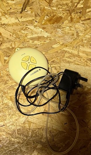 Medela Swing Flex Pump with manual & accessories