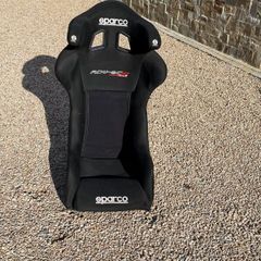Carbon racing seat