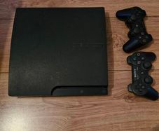 ps3  plus 2 controllers and 30 games