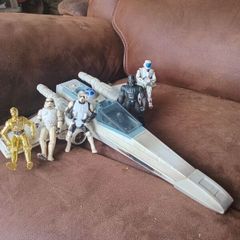 stars wars figures and jet ship