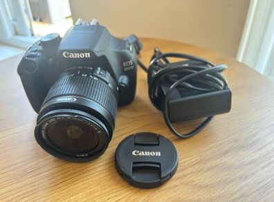 Canon EOS 1200D, DSLR camera with standard lens and charger