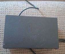 Portable Nitendo Switch, charging dock.