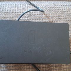 Portable Nitendo Switch, charging dock.