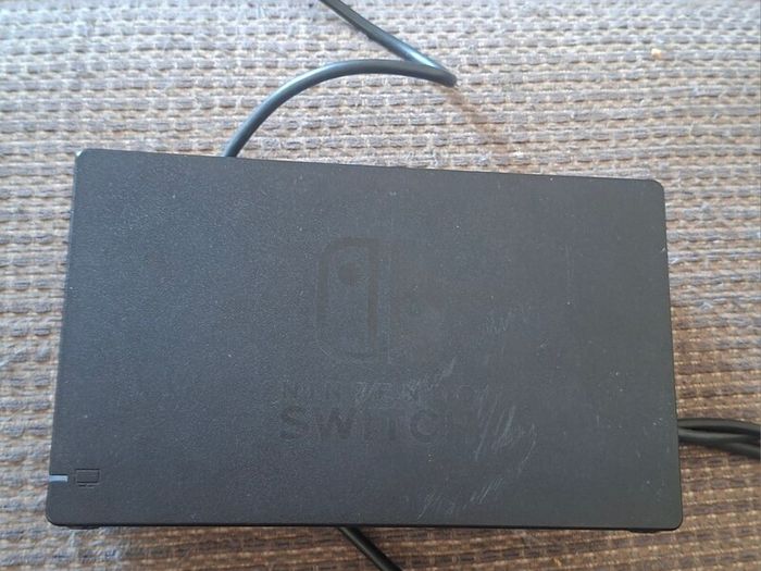 Portable Nitendo Switch, charging dock.