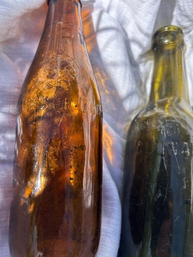 2  Vintage half pint glass Cork Advertising Bottles