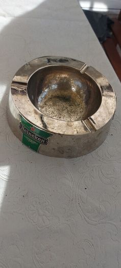 Heineken metal ashtray ,used condition, still nice condition ,buyer collects or pays postage thank you, sold as is,