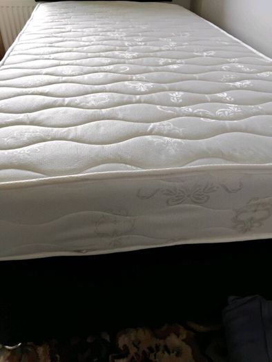 Single bed with matress and headboard