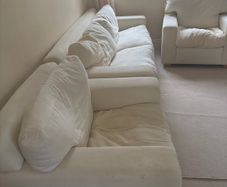 3 seater couch and 2 armchairs in cream