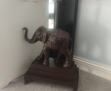 Ornate elephant glass table