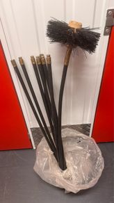 Chimney sweeping set with 7 flexible rods and chimney brush.