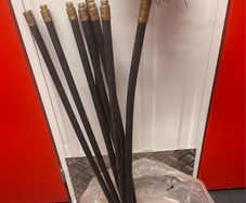 Chimney sweeping set with 7 flexible rods and chimney brush.