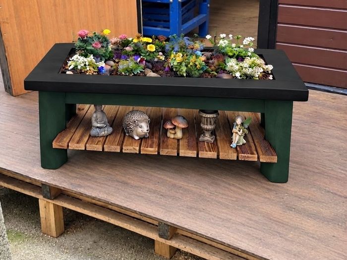 Large garden planter with display shelf