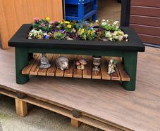 Large garden planter with display shelf