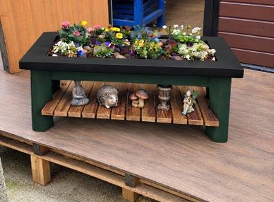 Large garden planter with display shelf