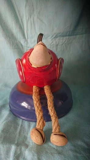 Clay rooster figurine