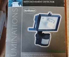Halogen floodlight with movement detector
