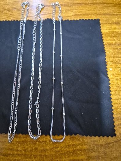 3 silver colour chains