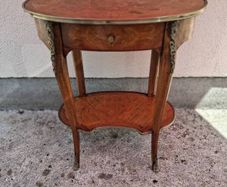 Oval Louis XV style marquetry side table