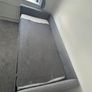 Grey Upholstered Daybed with Trundle and Mattresses Image 5