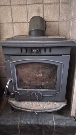 Stove with back boiler
