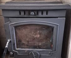 Stove with back boiler