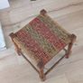 Antique wooden footstool with woven seat Image 3