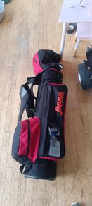 golf clubs, bag, trolley..