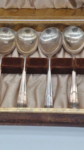 Cutlery set in a box .