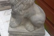 handcrafted concrete lions